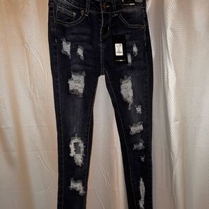 Dark blue ripped jeans from Fashion Nova